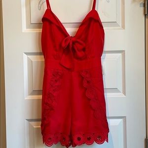 NWT.  Beautiful red romper.